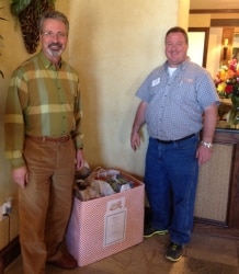 Kyle Taylor of Irving Cares picks up the food drive at Advanced Dental of Las Colinas